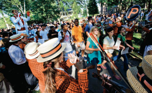 Freshmen march in the annual Pre-rade to the sounds of the University Band.