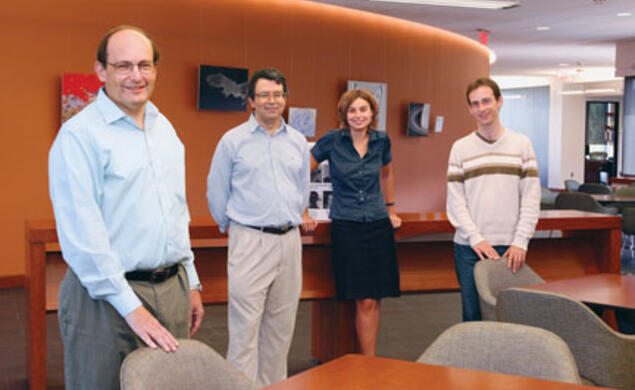 In the new home of the Center for Theoretical Science are, from left, center director Paul Steinhardt, associate director Igor Klebanov *86, and postdocs Aleksandra Walczak and Thomas Klose.