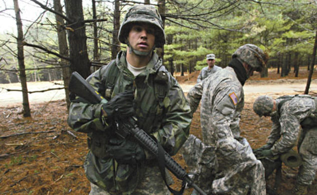 Peter Yorck ’10 with other ROTC cadets during field-training exercises March 28 at Fort Dix. At rear center is Lt. Col. John Stark, ROTC commander.