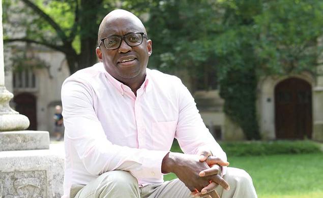 Jacob Dlamini sitting on steps on Princeton's campus.