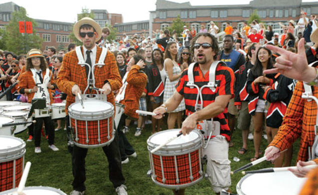 Stan Morton ’04 cranks it out with the University Band on Poe-Pardee Field at the end of the P-rade.