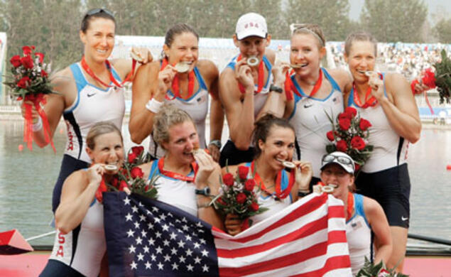 Caroline Lind '06, standing second from right, celebrates with members of the U.S. women’s eight after the team won the gold medal at the Beijing Olympics Aug. 17.