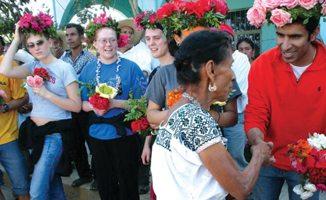 LIVE.Social_Kush.jpg Above, Cruz Blanca Initiative volunteers receive a traditional welcome in a rural Mexican community where they were building a water well. From left: Alexandra Connell ’07, Jevon Harding ’06, Owen Fletcher ’08, a community elder, and Kush Parmar ’