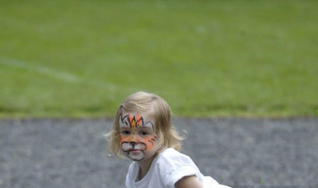 Sophia Cardona-Fox, great-granddaughter of the late Fred E. Fox '39, enjoys a Reunions visit to Cannon Green. 