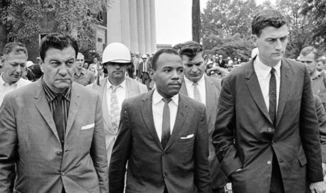 John Doar ’44, right, escorts James Meredith at the University of Mississippi in 1962.