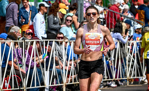 Maddie Offstein runs in a race.