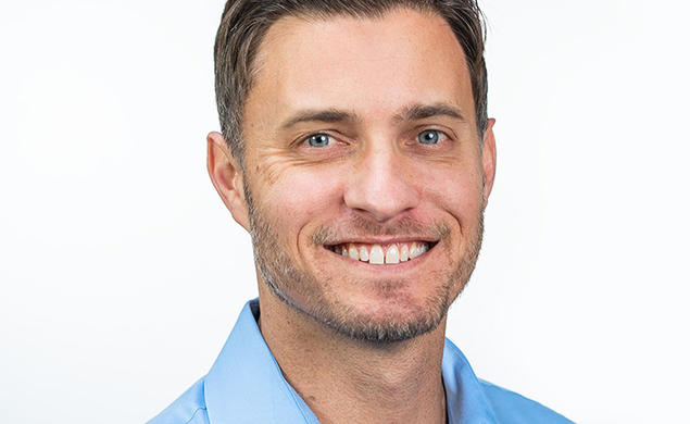 This is a headshot photo of Mark Herrema ’04