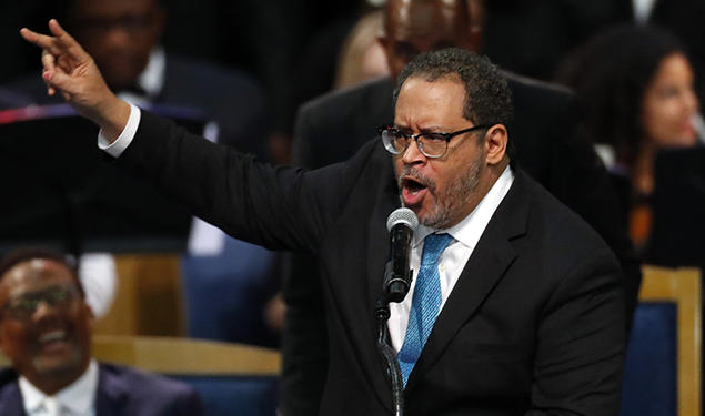 Michael Eric Dyson *93  speaks during the funeral service for Aretha Franklin at Greater Grace Temple in Detroit in 2018.