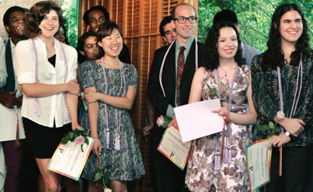 After receiving their lavender honor cords, rainbow ­tassels, certificates, and lavender roses during the LGBT Center’s Lavender Graduation at Prospect House, students smile at the comments of another member of the Class of ’13.