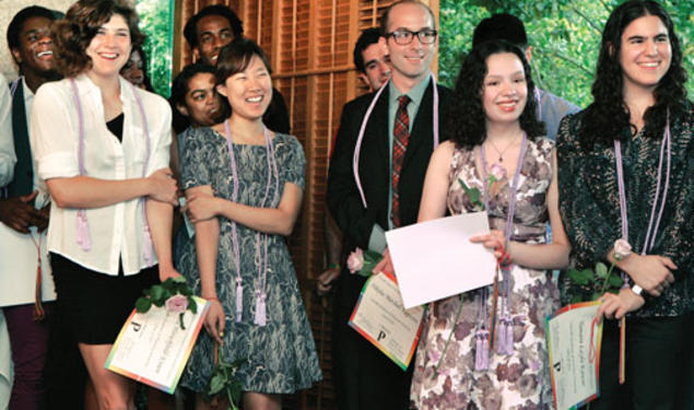 After receiving their lavender honor cords, rainbow ­tassels, certificates, and lavender roses during the LGBT Center’s Lavender Graduation at Prospect House, students smile at the comments of another member of the Class of ’13.