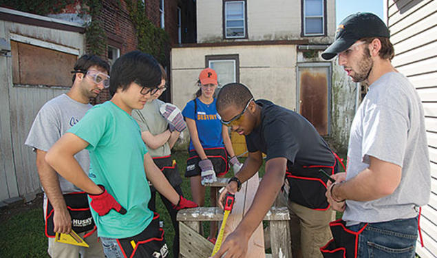 Princeton students help to renovate a Habitat for Humanity home in Trenton, N.J., in August 2013 as part of the Community Action program.