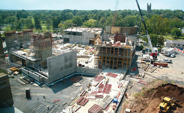 Concrete and steel have been rising for the three buildings on Alexander Street that will provide academic, rehearsal, and performance spaces for the music department, at left, and for the Lewis Center for the Arts.