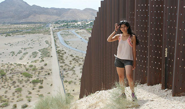 Yessica Martinez ’15 along the U.S.-Mexico border last summer on a research trip for her thesis.