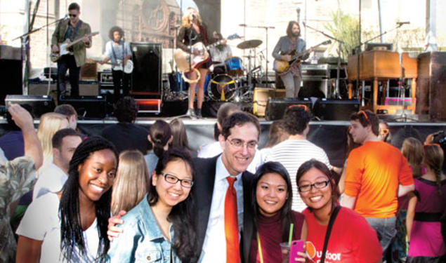 President Eisgruber ’83 poses with students during the concert that followed his installation.