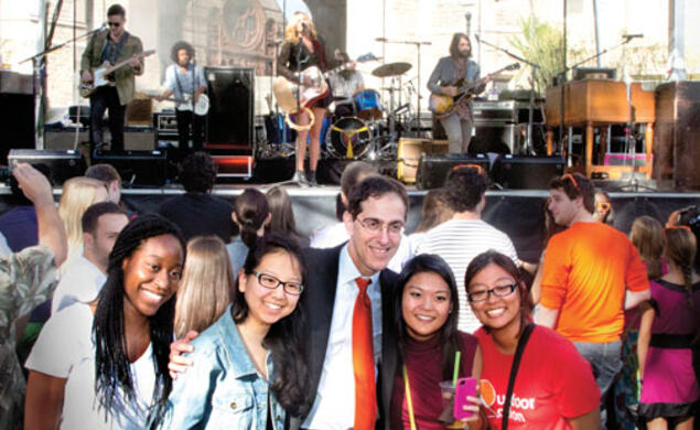 President Eisgruber ’83 poses with students during the concert that followed his installation.