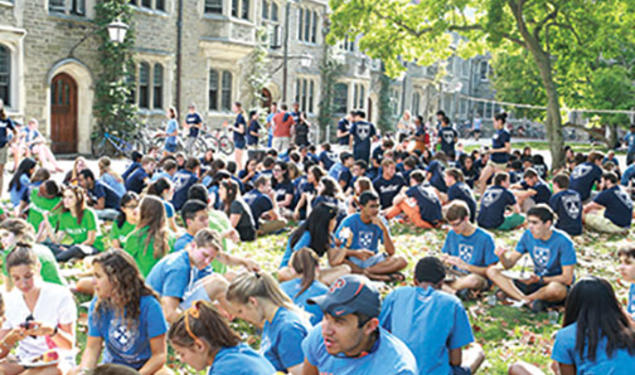 Following Opening Exercises and the Pre-rade, freshmen gathered for a barbecue on Alexander Beach.