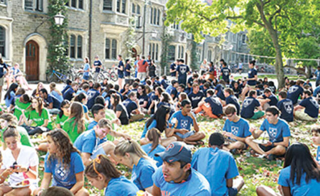 Following Opening Exercises and the Pre-rade, freshmen gathered for a barbecue on Alexander Beach.