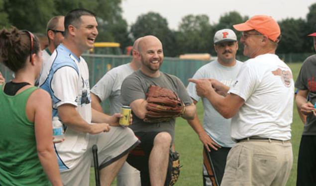 Professor Alain Kornhauser *71, far right, is Mr. Summer Softball. He says that alumni stop him in airports to chat about the league, years after they’ve left Princeton.