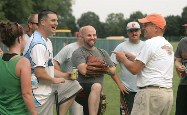 Professor Alain Kornhauser *71, far right, is Mr. Summer Softball. He says that alumni stop him in airports to chat about the league, years after they’ve left Princeton.