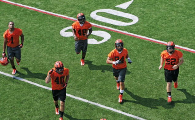 This year’s football team (pictured at the first practice of the season) has a promising roster of returning players.