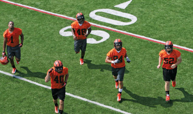 This year’s football team (pictured at the first practice of the season) has a promising roster of returning players.