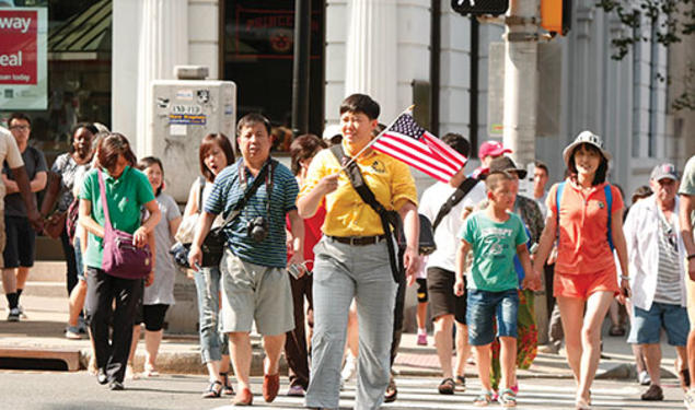 Frank Wojciechowski - A University-bound tour group crosses Nassau Street.