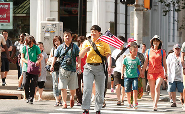 Frank Wojciechowski - A University-bound tour group crosses Nassau Street.