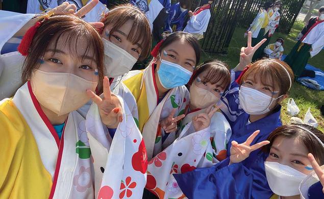 Anne Wen ’23, at center in blue mask, attends a traditional Japanese festival in Osaka, Japan