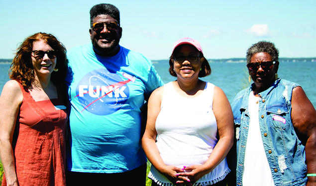 Allison Thomas ’78, Rufus Frazier, Maria Montgomery, and Shirley Frazier pose for photo.