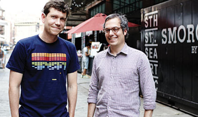   Jonathan Butler ’92, left, and his business partner Eric Demby at the Brooklyn Flea’s SmorgasBar at South Street Seaport in Manhattan.