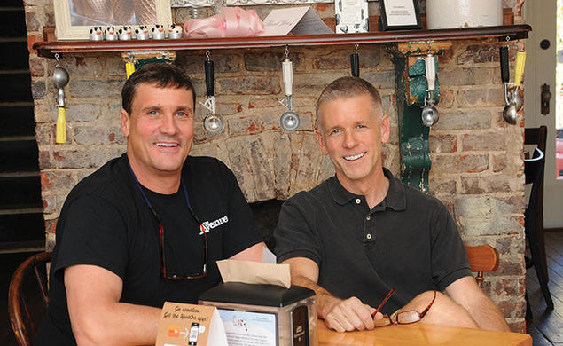 Tim Koons-McGee ’80, left, and his husband, Roy, resolved to embark on a career together: running an ice cream shop.