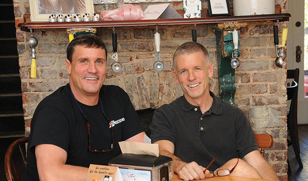 Tim Koons-McGee ’80, left, and his husband, Roy, resolved to embark on a career together: running an ice cream shop.