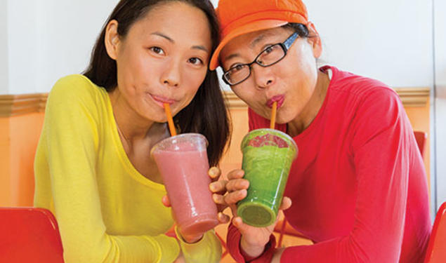 Yuchen Zhang ’10, left, and her mother, Tanyue Chen, run a smoothie shop in downtown Santa Monica.