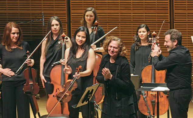 The music of Julia Wolfe *12, center, incorporates elements of classical music, rock, jazz, folk, and pop.