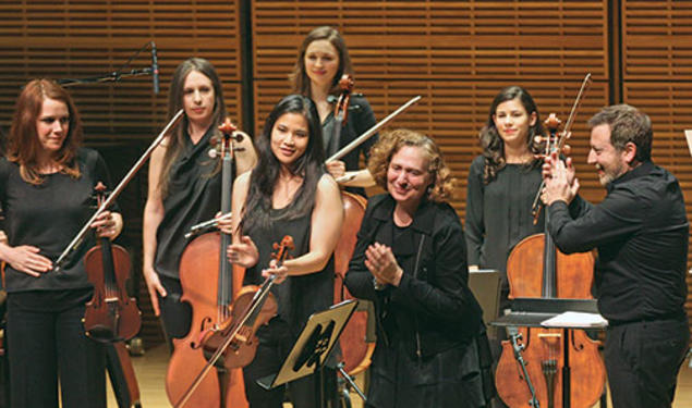 The music of Julia Wolfe *12, center, incorporates elements of classical music, rock, jazz, folk, and pop.