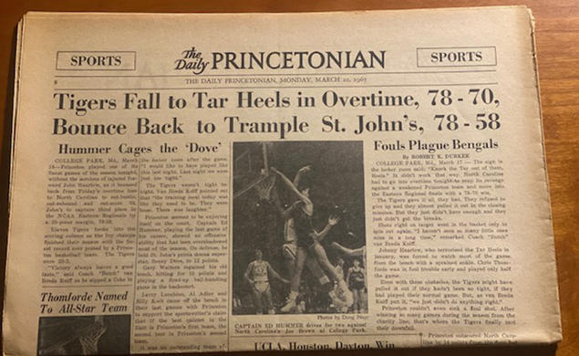 A yellowed copy of The Daily Princetonian on March 20, 1967, with a banner headline reading, "Tigers Fall to Tar Heels in Overtime, 78-70, Bounce Back to Trample St. John’s, 78-58."