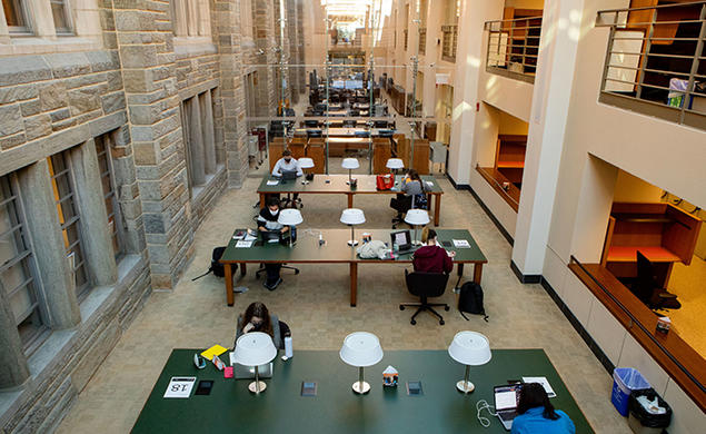 Students study in Firestone Library in 2021.
