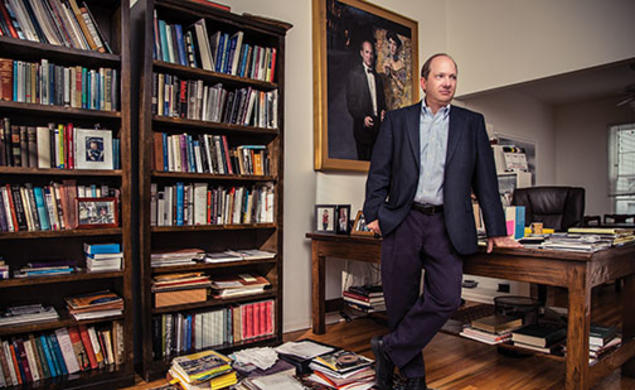 E. Randol Schoenberg ’88 at home in Los Angeles. The large framed picture is a portrait of him with the painting he helped retrieve.