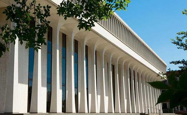 Robertson Hall, home of the Princeton School of Public and International Affairs, has a modern facade with columns.