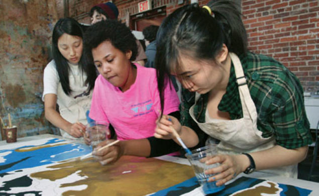 Students paint during a Princeton Atelier class on public murals.