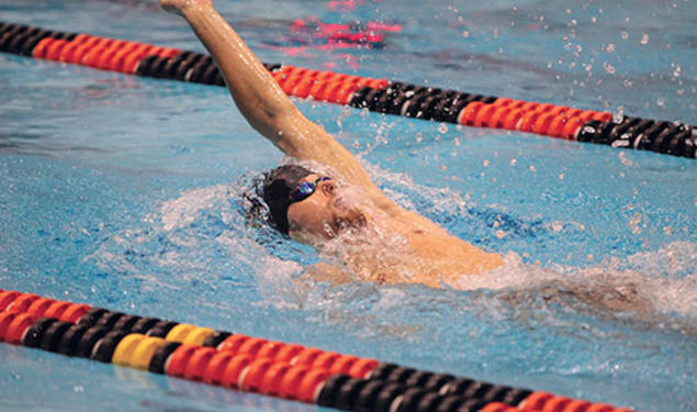 Swimmer Andrew Helber ’16 also serves as performance director of the Nassoons.