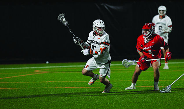 Lacrosse player Alex Slusher, number 5, in white jersey and helmet, running around a defensive player