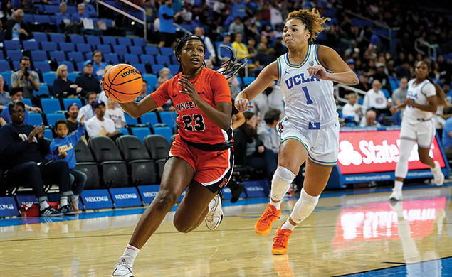 Madison St. Rose ’26 drives to the basket against UCLA