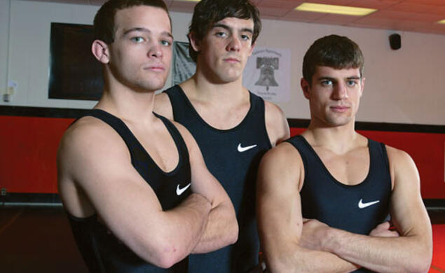 From left, Garrett Frey ’13, Daniel Kolodzik ’12, and Tony Comunale ’12, co-captains of the wrestling team. 