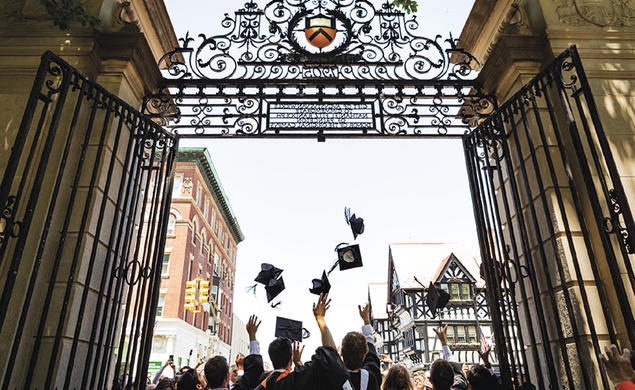 Princeton’s newest alumni make their exit through FitzRandolph Gate following Commencement.