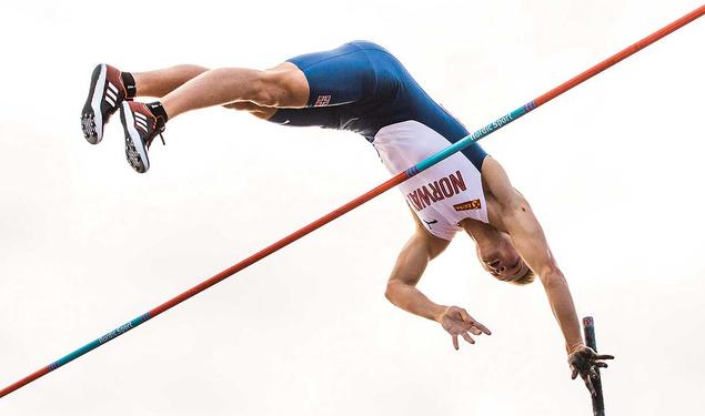 This is a photo of Sondre Guttormsen ’23 competing in the pole vault for Norway.
