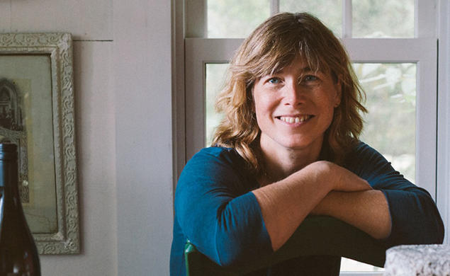 This is a photo of Madeleine Vedel ’89 in front of a window.