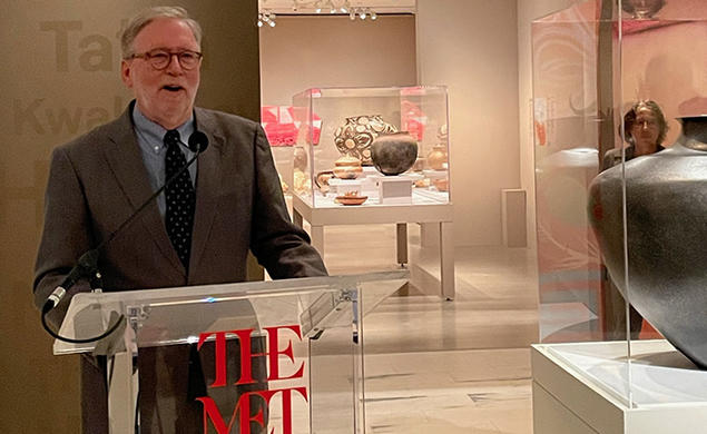 Michael Brown ’72 speaks at The Met in front of the Pueblo pottery exhibit.