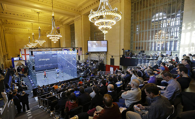 Fans watch the Tournament of Champions squash tournament at New York City’s Grand Central Terminal in January 2015. 
