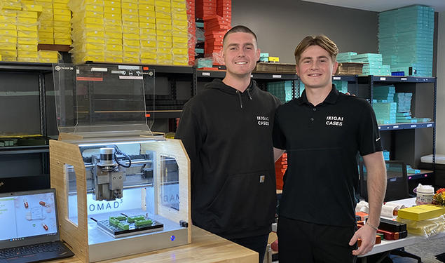 Tavish Rice ’20, left, and his brother Breton at work in a lab.